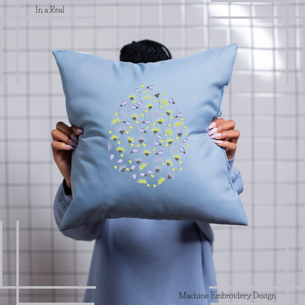 A colorful Easter egg adorned with intricate floral patterns displayed on a pillow