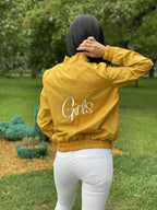 Embroidery design featuring a cute girl on clothing, ideal for creating playful and stylish outfits.