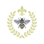  Intricate machine embroidery design featuring a regal bee surrounded by a laurel frame